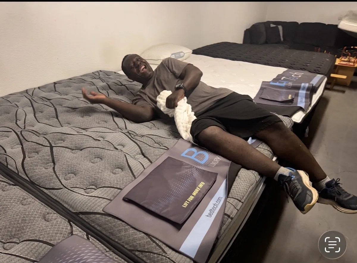 Customer testing a new mattress at our Elk Grove showroom