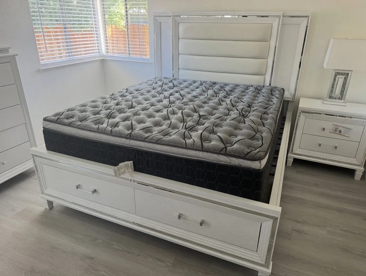 Premium queen mattress on a white storage bed
